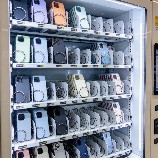 phone case vending machine with several empty sold out slots
